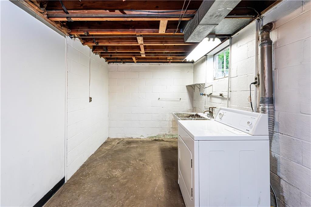 13740 Ridge Road Irwin, PA 15642 - Photo 28 of 43 a utility room with dryer and washer