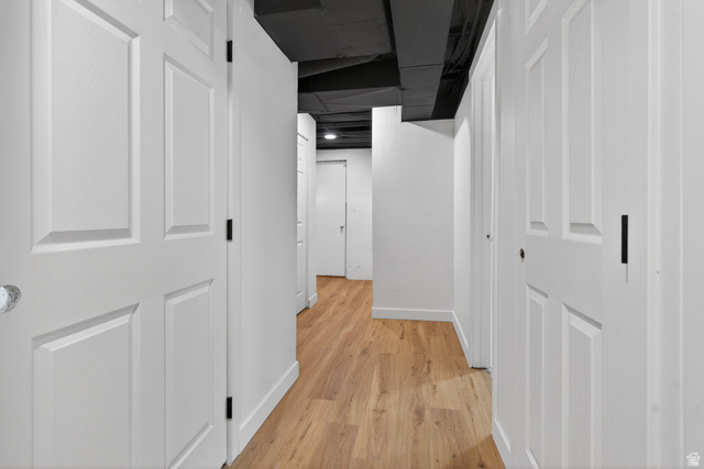 489 Owens Street Layton, UT 84041 - Photo 14 of 25 Hallway featuring baseboards and light wood-type flooring