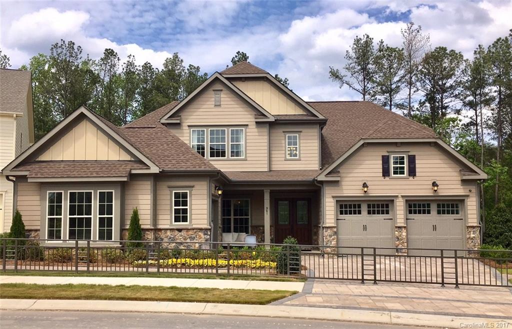 961 Emory Lane, Unit 59 Fort Mill, SC 29708 - Photo 1 of 7 a front view of a house with a yard