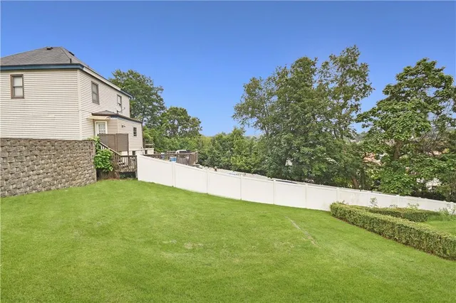 a view of a yard with an outdoor space