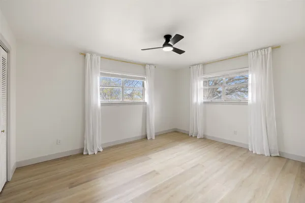 a room with furniture and windows