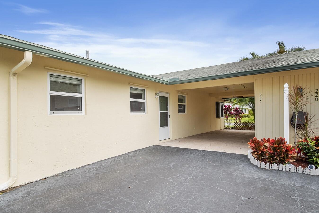 227 Cardinal Lane Delray Beach, FL 33445 - Photo 19 of 33 Carport