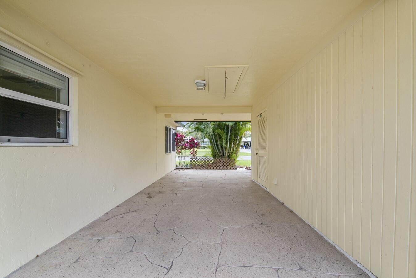 227 Cardinal Lane Delray Beach, FL 33445 - Photo 20 of 33 Carport