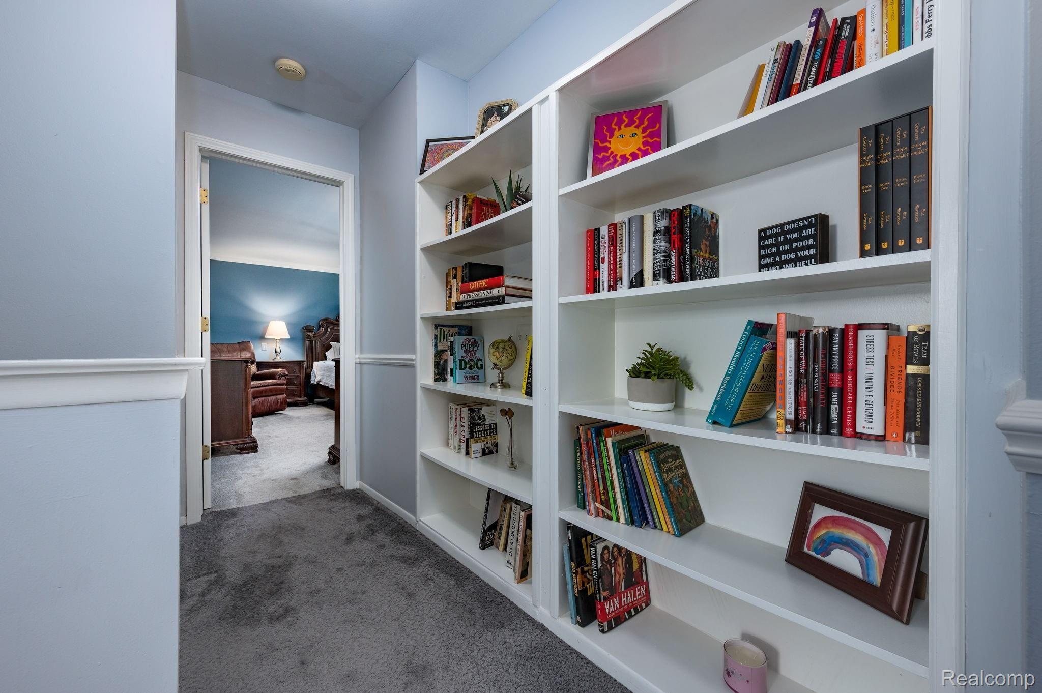 1639 Grandview Drive Rochester, MI 48306 - Photo 17 of 29 Built in bookshelf adds character to the upstairs hallway