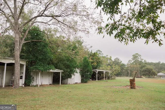 a house with trees in the background