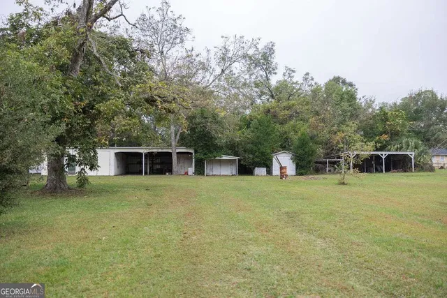 a house with trees in the background