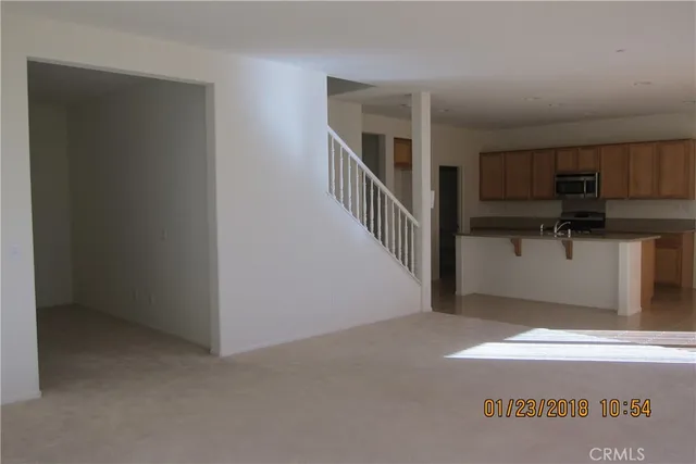 a view of a hallway with entryway