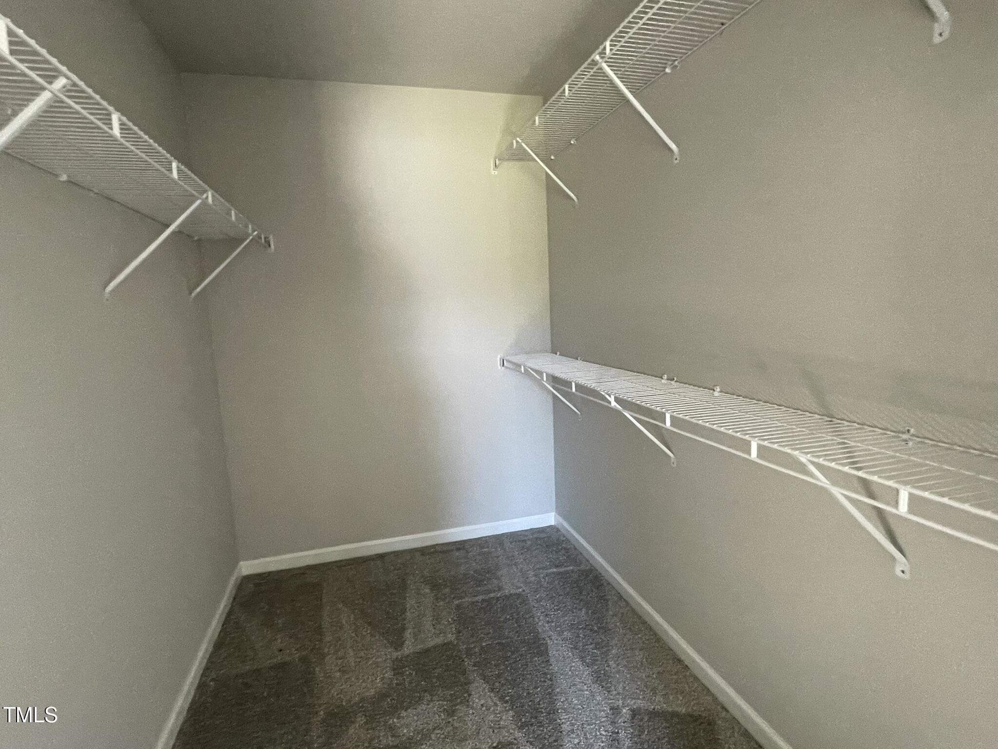 42 Heatherglenn Circle Princeton, NC 27569 - Photo 9 of 15 a view of a room with racks on the wall