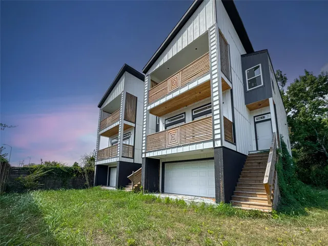 a house with yard in front of it