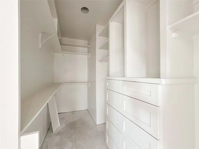 a bathroom with a bathtub and a sink