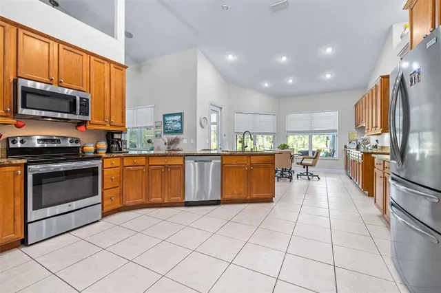 a bathroom with a tub sink and a window