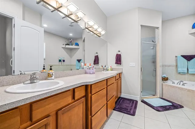 a view of a swimming pool with a patio and a yard