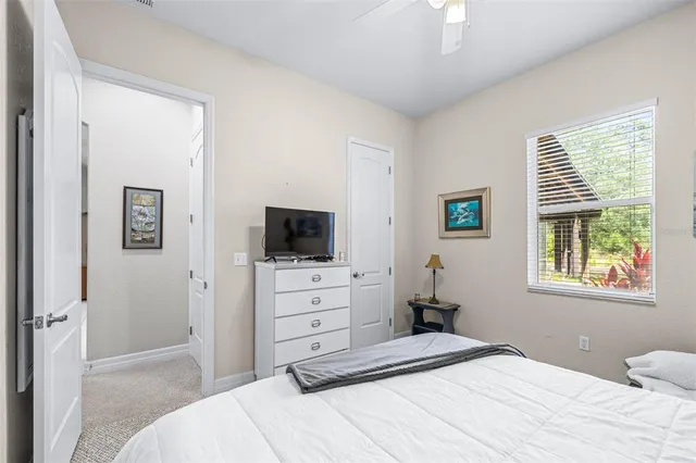 a view of a house with backyard and garden