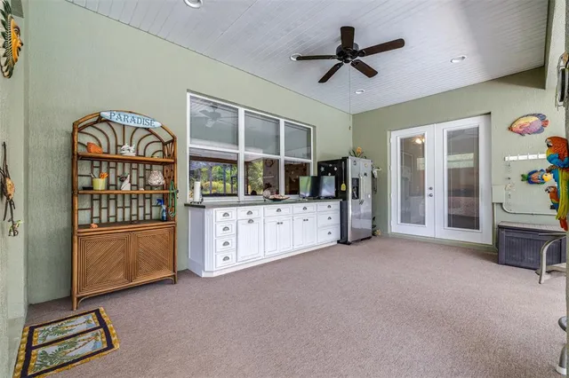 a front view of a house with a yard and garden