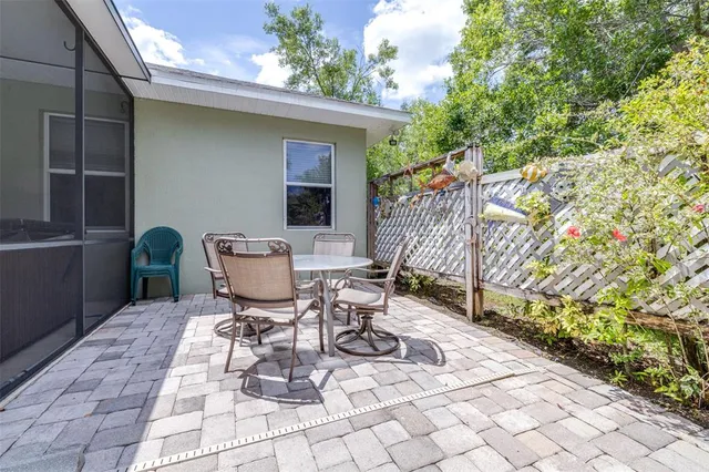 a view of a lake with houses in the back
