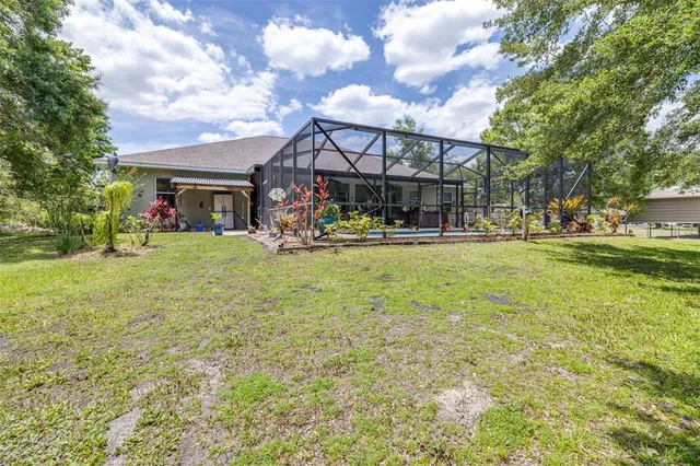 a view of outdoor space and yard