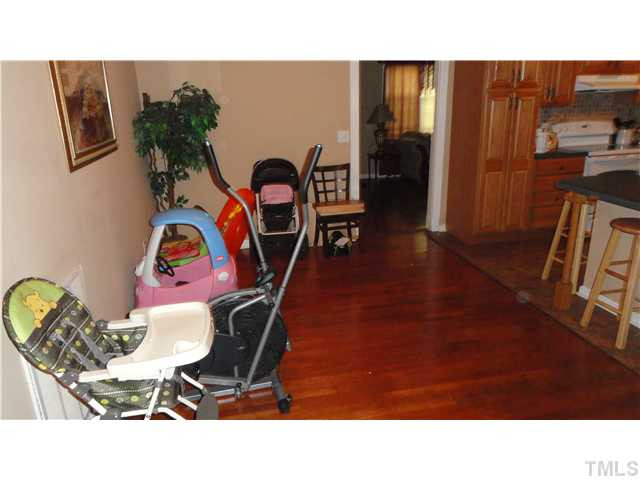 821 Carlisle Street Raleigh, NC 27610 - Photo 7 of 20 Not currently being used as a dining room. Dining Room