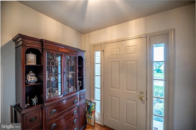a view of front door with hallway