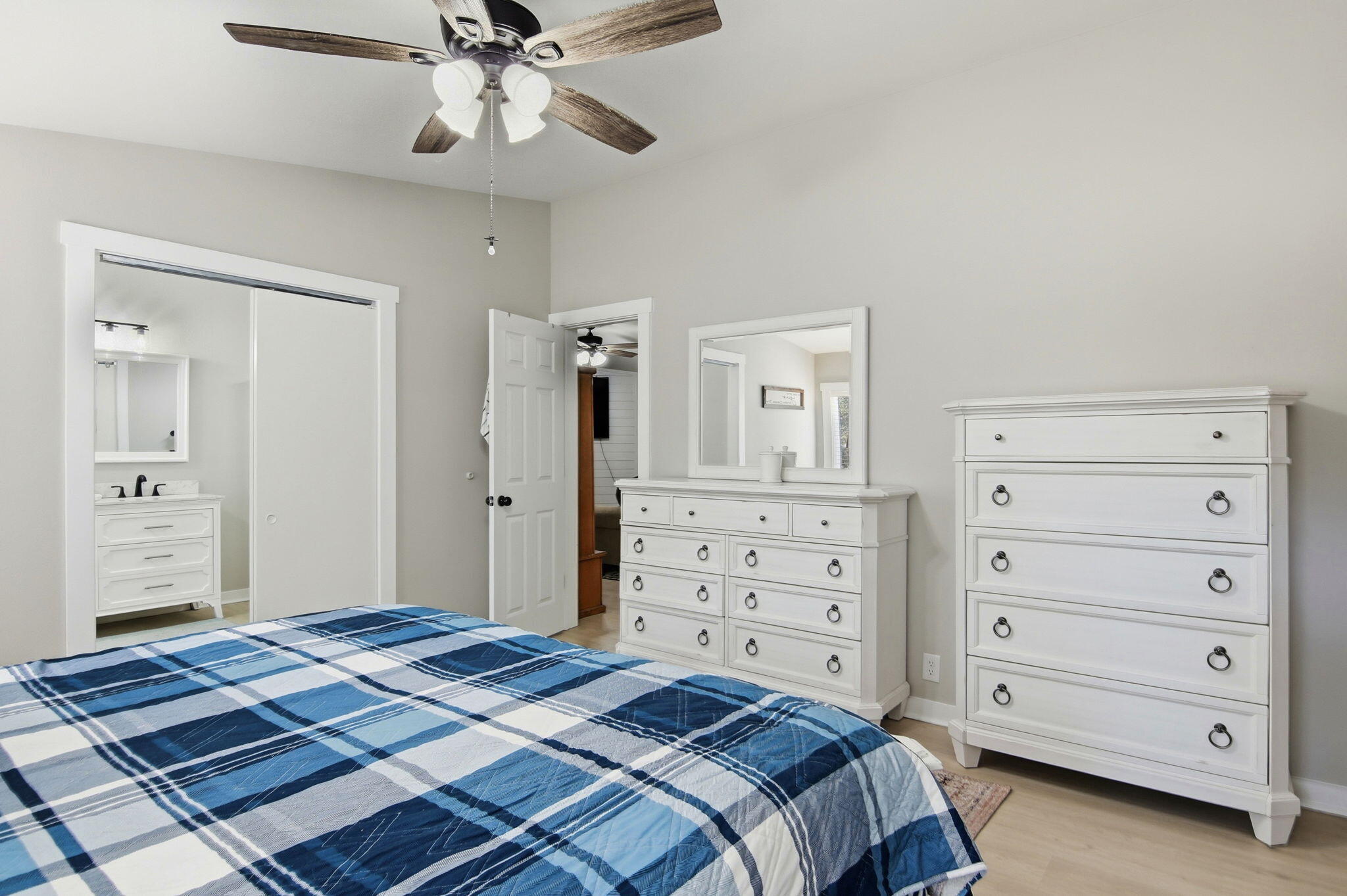6108 Old River Road Baker, FL 32531 - Photo 25 of 40 a bedroom with a bed and a dresser