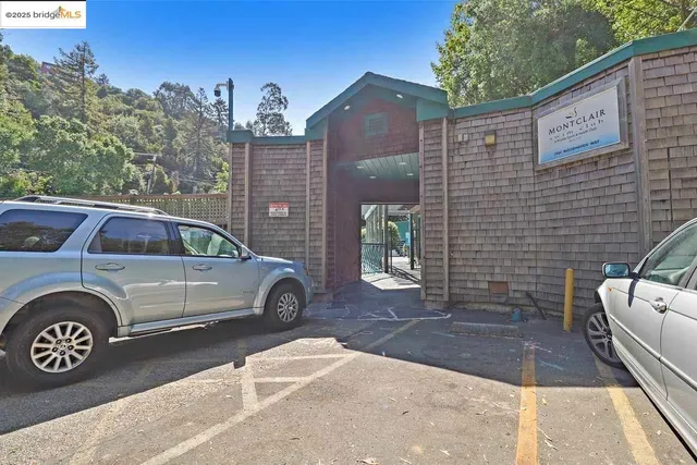 a view of a backyard with sitting area