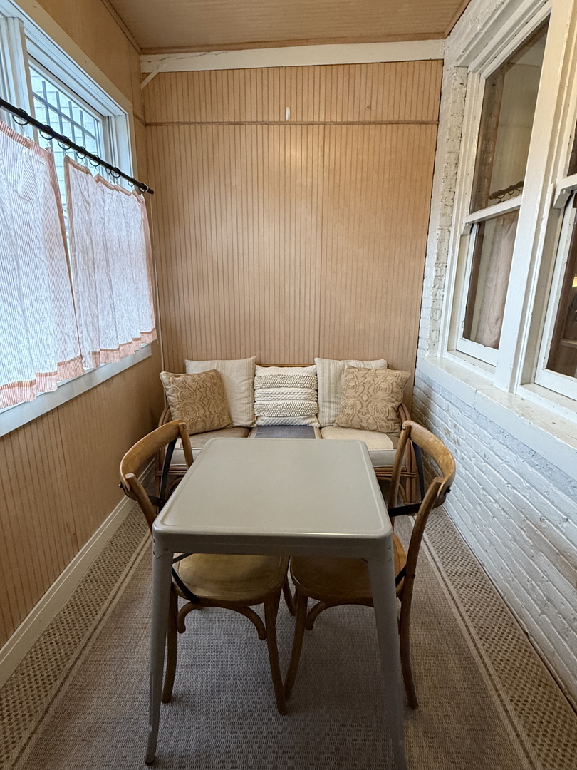 2134 North Damen Avenue, Unit 2 Chicago, IL 60647 - Photo 21 of 22 a view of a room with furniture and a window