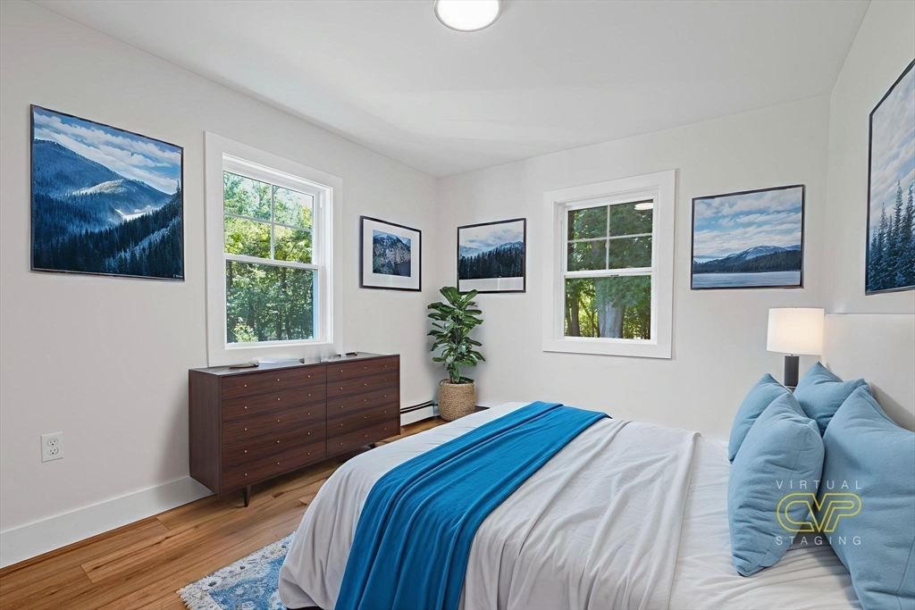 282 Parker Road Barnstable, MA 02668 - Photo 14 of 17 a bedroom with a bed and a window