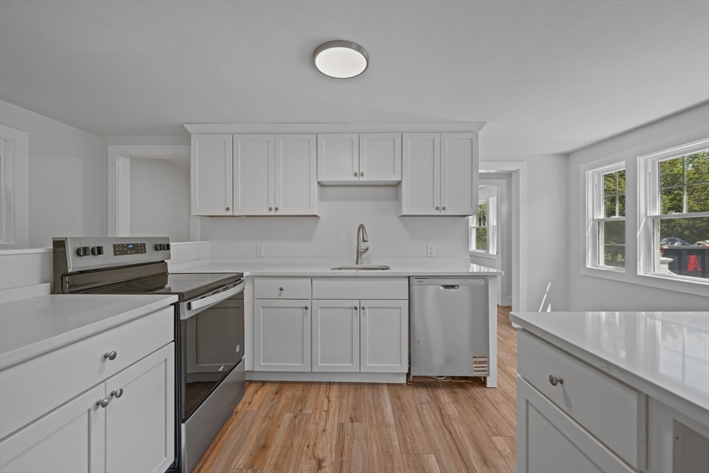 282 Parker Road Barnstable, MA 02668 - Photo 2 of 17 a kitchen with cabinets oven and a dishwasher