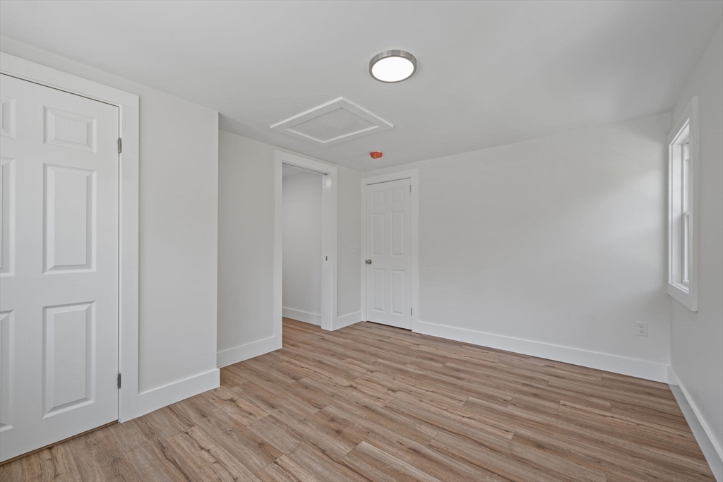 282 Parker Road Barnstable, MA 02668 - Photo 9 of 17 a view of empty room with wooden floor and fan