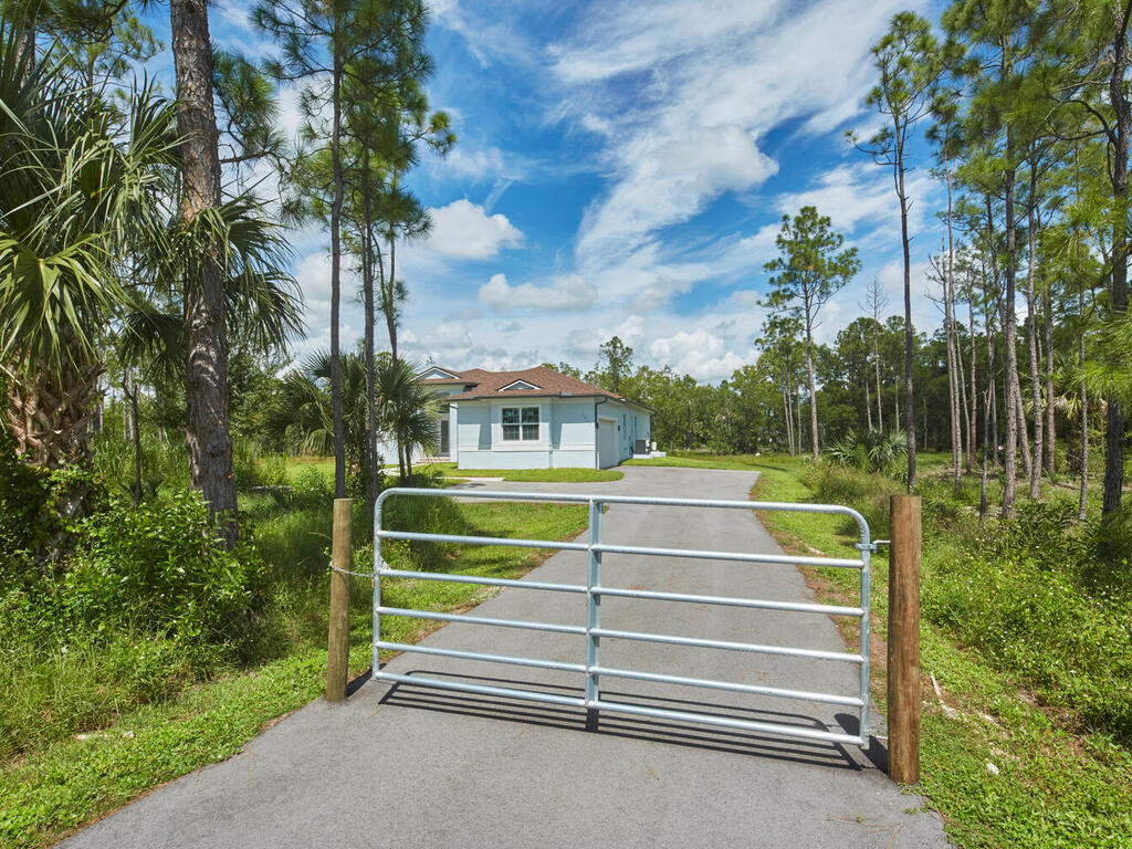 3677 Oil Well Road Naples, FL 34120 - Photo 3 of 28 a view of stairs and garden