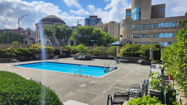 a view of a house with swimming pool