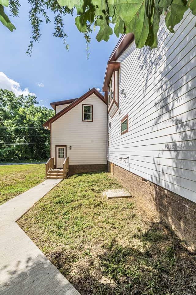 3 Cherry Street Stanton, TN 38069 - Photo 27 of 28 Sidewalks around the exterior make it easy to access all areas.