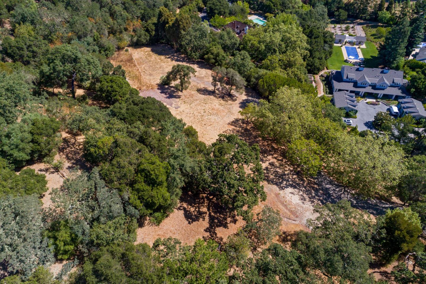 308 Olive Hill Lane Woodside, CA 94062 - Photo 8 of 9 an aerial view of house with yard and outdoor seating