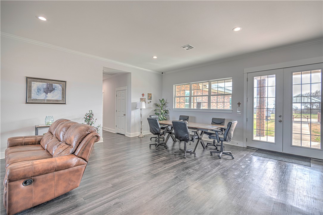4948 Woodlawn Road Lorena, TX 76655 - Photo 14 of 48 a living room with furniture and a a dining table