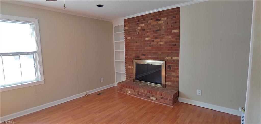 123 Cedar Ridge Road Mocksville, NC 27028 - Photo 11 of 25 Den wood burning fireplace