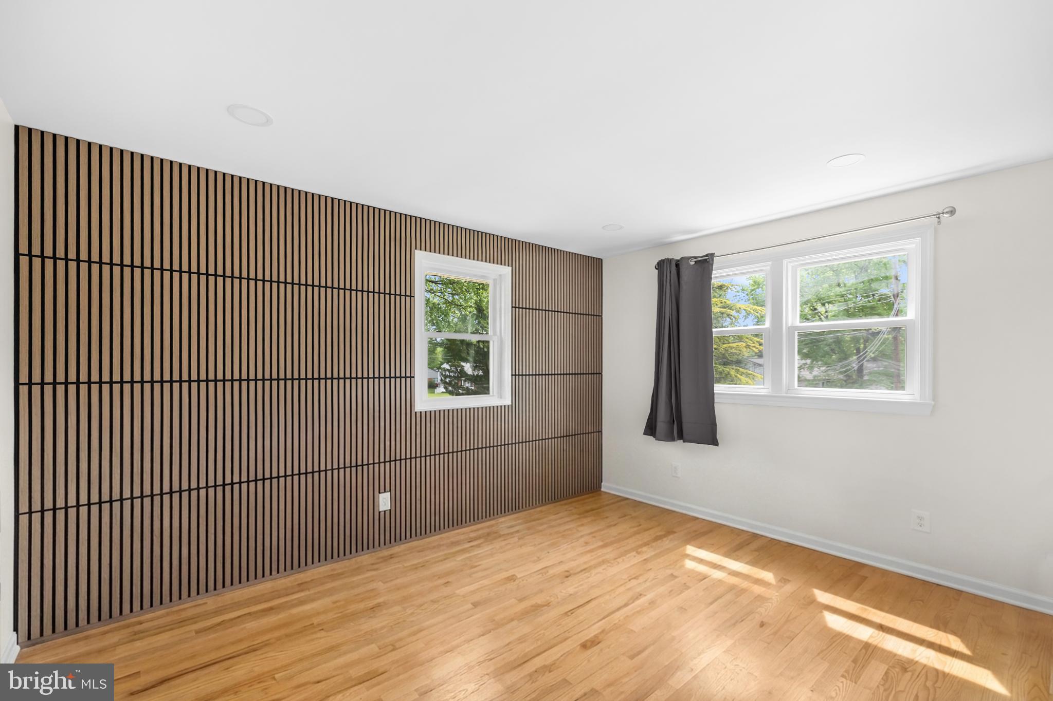 7402 Dunston Street Springfield, VA 22151 - Photo 23 of 37 a view of an empty room with a window