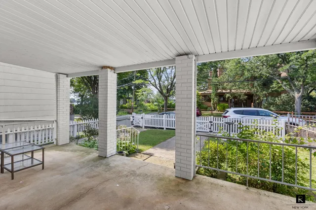 a house view with a garden space