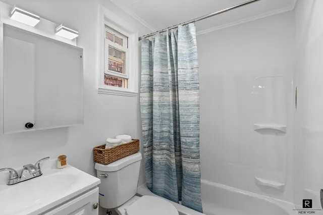 a kitchen that has a microwave and a stove