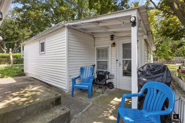 a bathroom with a sink and a shower curtain