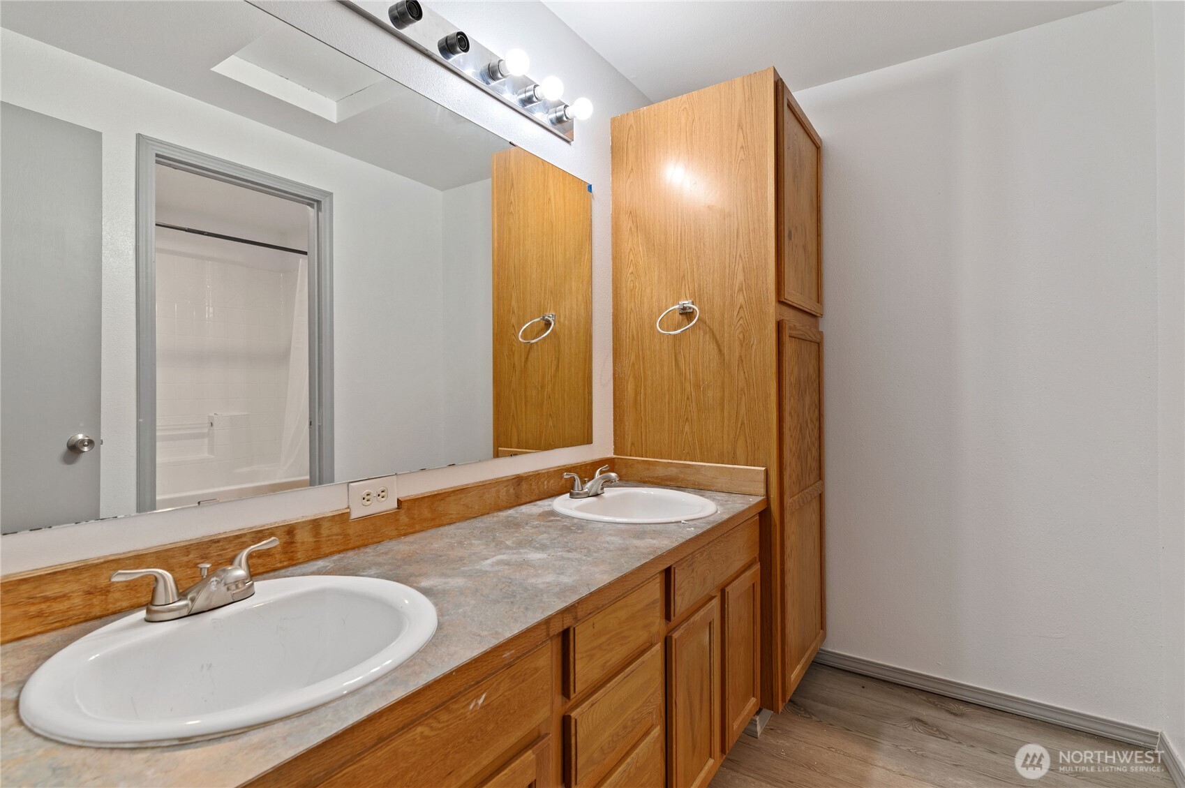 5151 East Pickering Road Shelton, WA 98584 - Photo 25 of 27 a bathroom with a granite countertop sink and a mirror