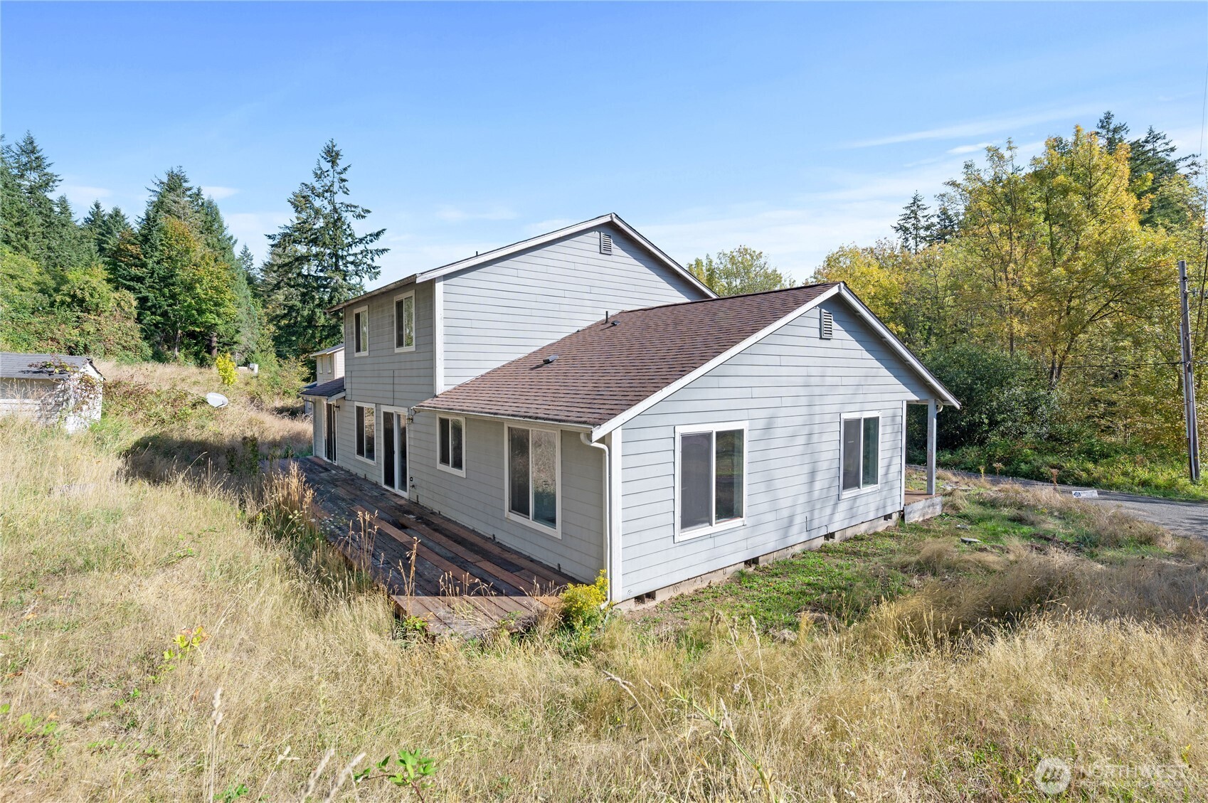 5151 East Pickering Road Shelton, WA 98584 - Photo 3 of 27 a view of a house with a yard