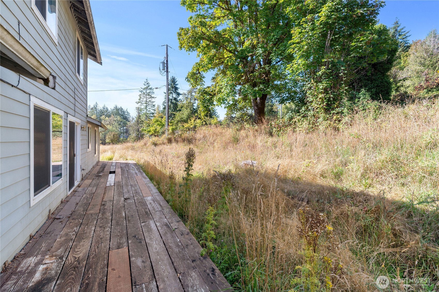 5151 East Pickering Road Shelton, WA 98584 - Photo 4 of 27 a view of a backyard of the house