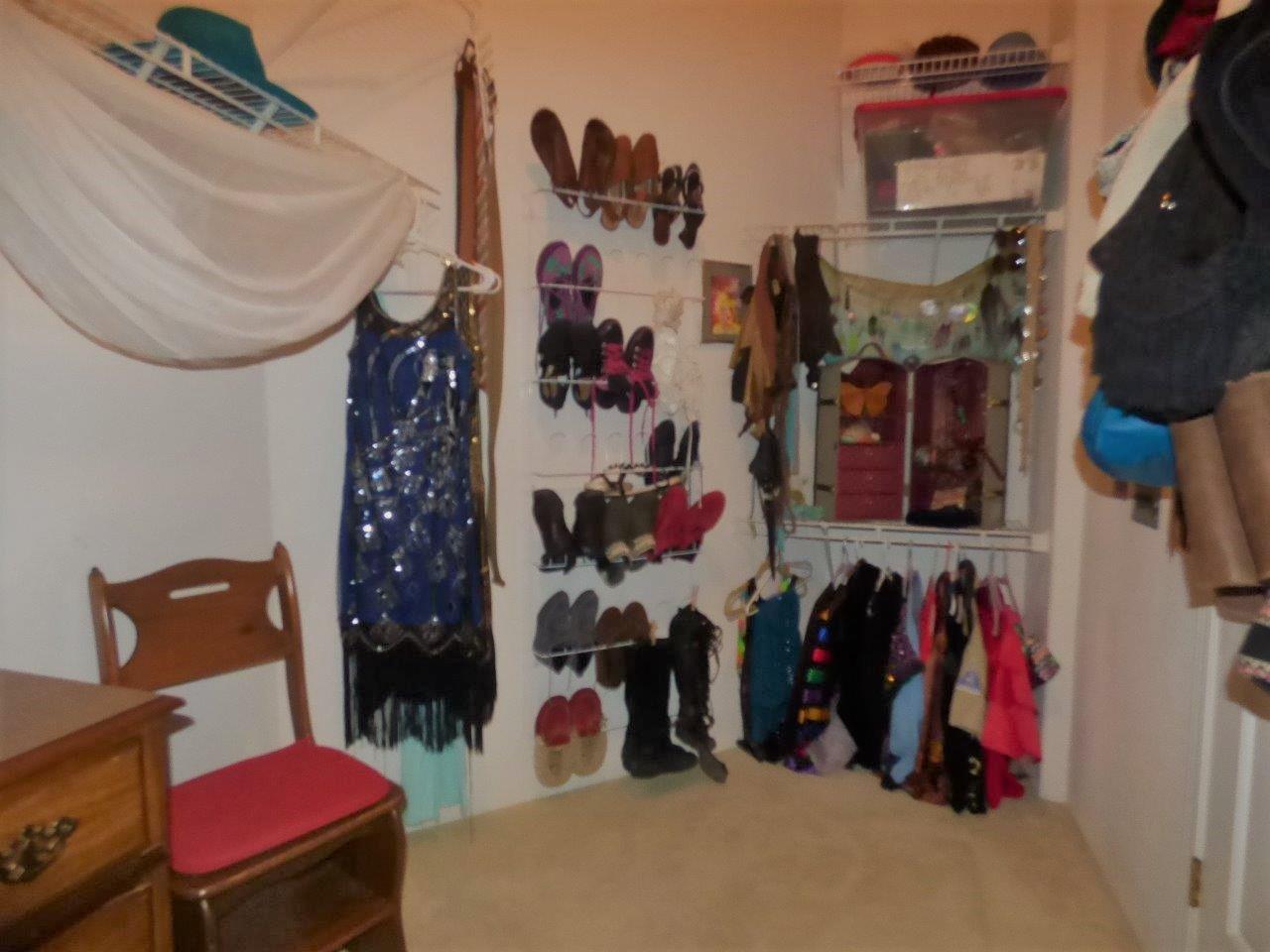 6520 Tunnel Loop Road Grants Pass, OR 97526 - Photo 27 of 69 a view of walk in closet with clothes and shoes