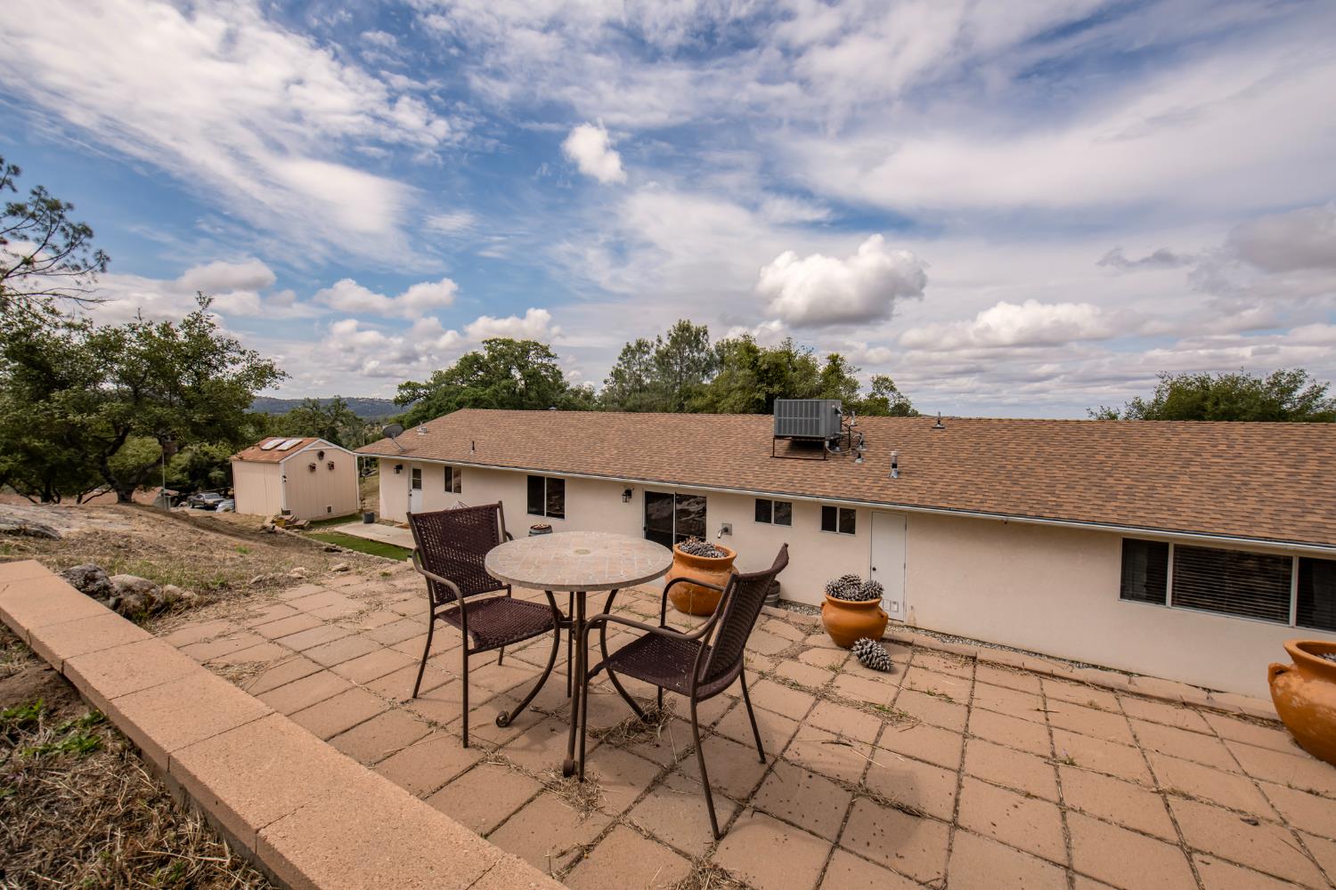 29395 Revis Road Coarsegold, CA 93614 - Photo 24 of 32 a view of a terrace with sitting area
