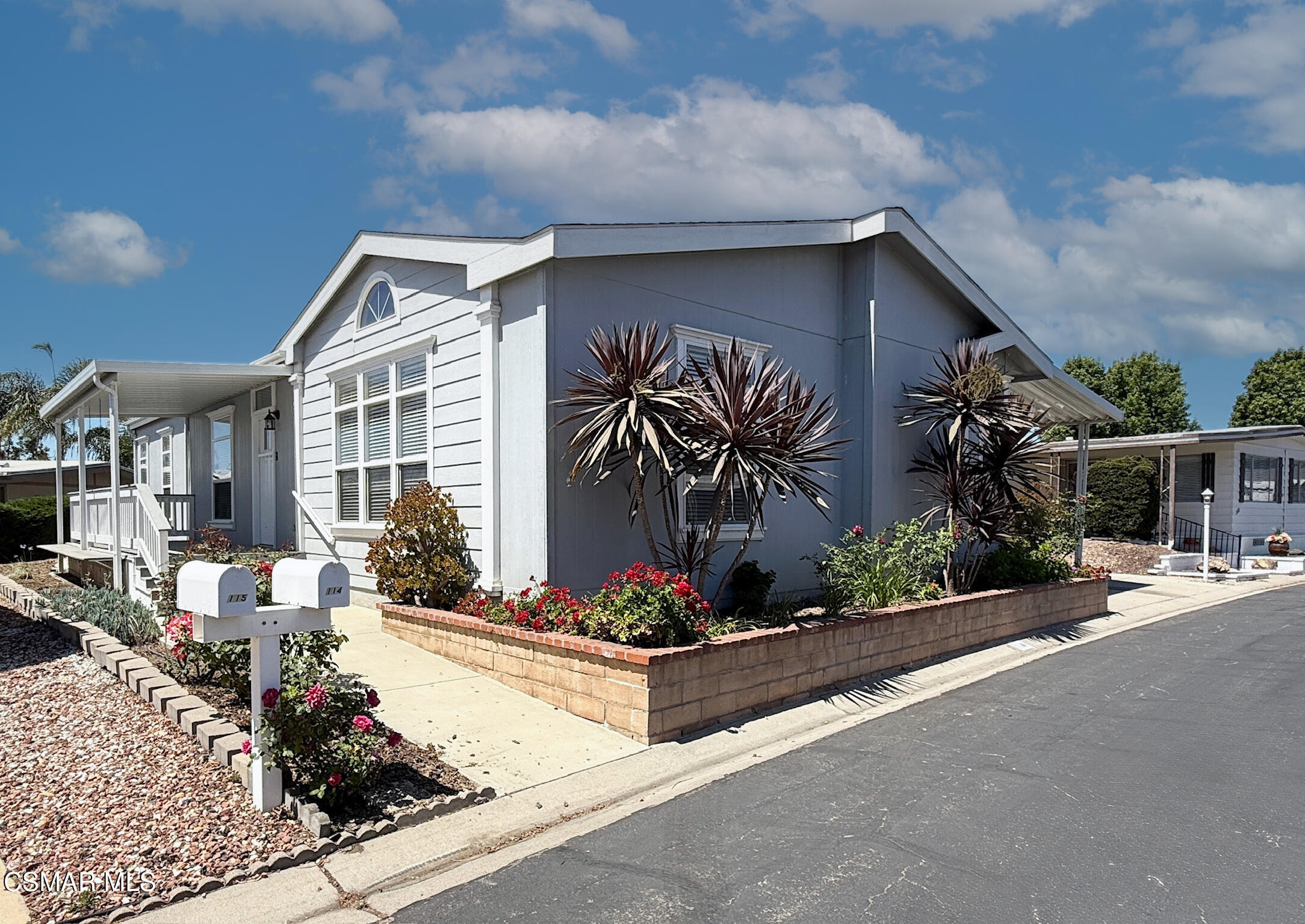 a front view of a house having yard