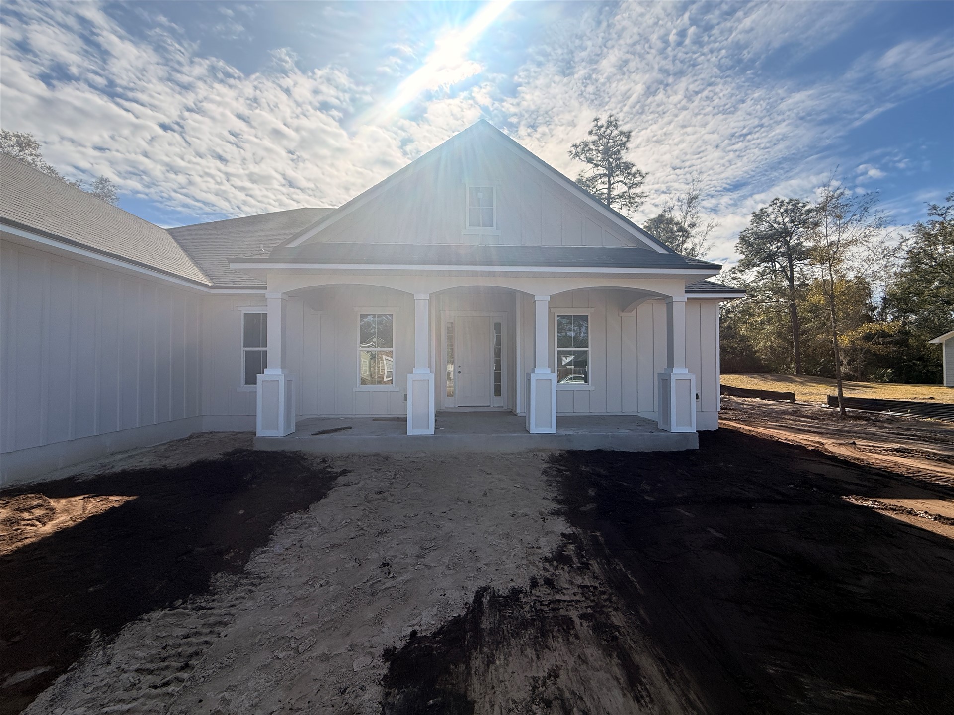 96076 Captains Pointe Road Yulee, FL 32097 - Photo 2 of 11 a front view of a house with a yard