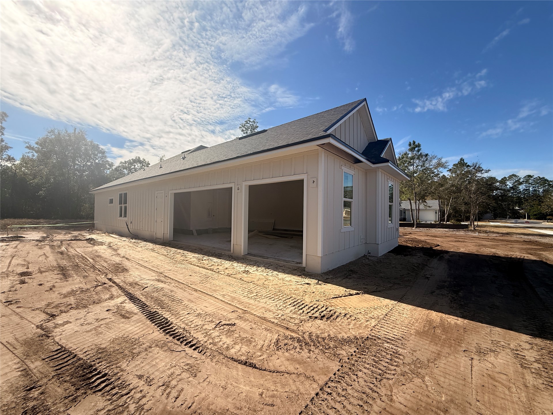 96076 Captains Pointe Road Yulee, FL 32097 - Photo 3 of 11 a front view of a house with a yard