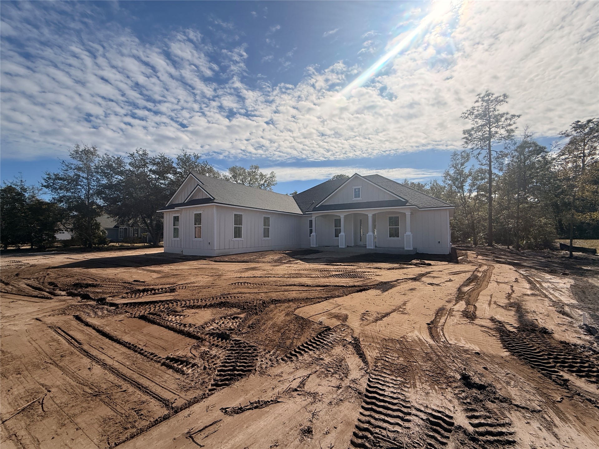96076 Captains Pointe Road Yulee, FL 32097 - Photo 4 of 11 a front view of a house with a yard