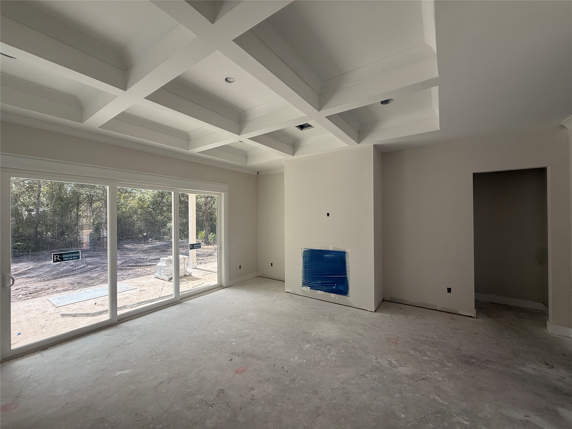 96076 Captains Pointe Road Yulee, FL 32097 - Photo 5 of 11 a view of an empty room with glass door and a ceiling fan