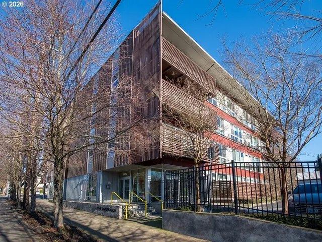 a view of a building with a iron gate