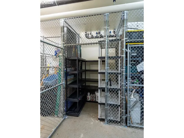 a room with shelves and a chandelier